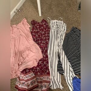 Girls dresses and one romper. Fit sizes 12 & 14